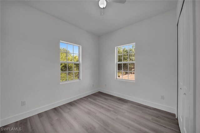 3109 11th St W, Lehigh Acres, FL 33971 - unfurnished room with baseboards, ceiling fan, and a healthy amount of sunlight