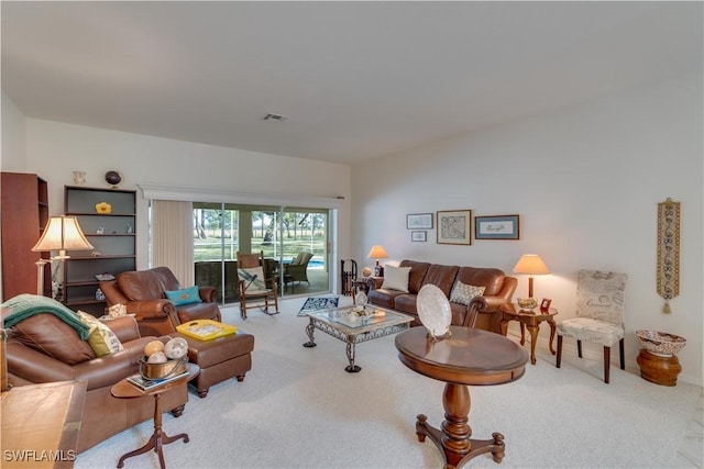 1132 Riverbend Dr, Labelle, FL 33935 - carpeted living area with visible vents