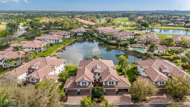 bird's eye view with a residential view and a water view