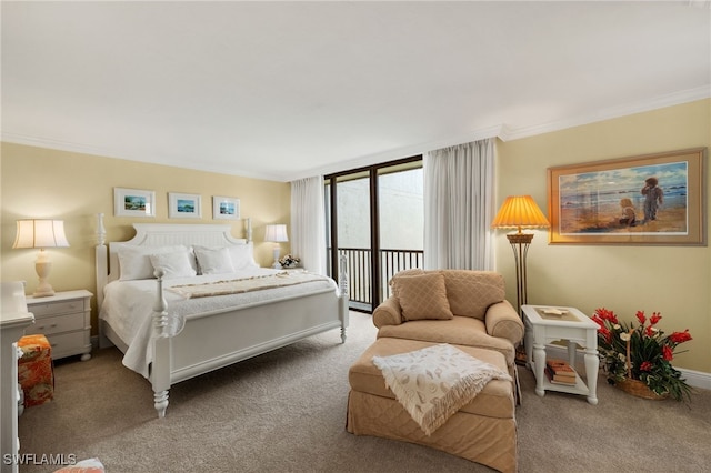 carpeted bedroom featuring access to outside, baseboards, and ornamental molding