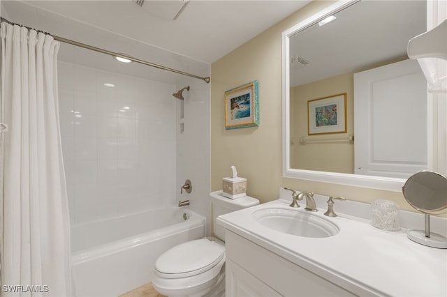 full bathroom featuring visible vents, vanity, toilet, and shower / tub combo