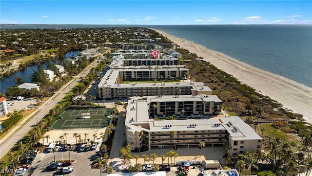 bird's eye view with a beach view and a water view