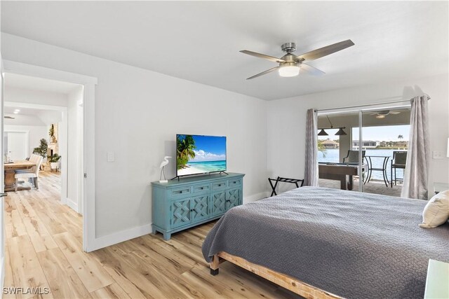 bedroom featuring a ceiling fan, access to outside, baseboards, and light wood finished floors