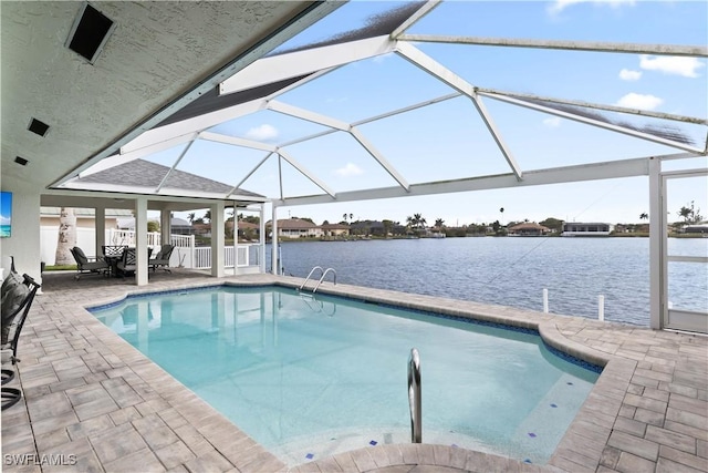 pool featuring a water view, glass enclosure, fence, and a patio