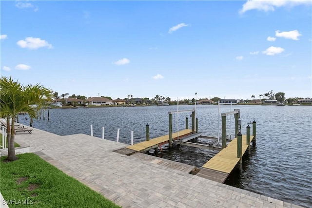 view of dock with a water view and boat lift