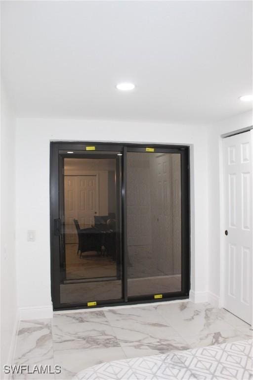 interior details with recessed lighting and baseboards