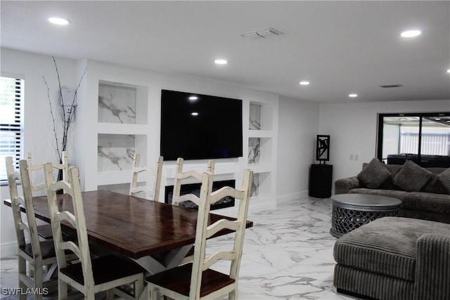 dining room featuring visible vents, recessed lighting, marble finish floor, and baseboards