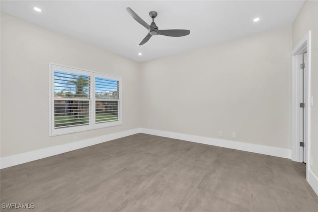 empty room with a ceiling fan, recessed lighting, and baseboards