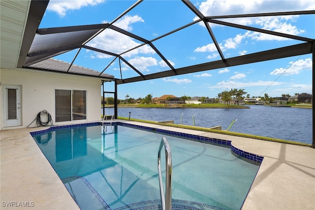 outdoor pool featuring a water view, a patio area, and glass enclosure