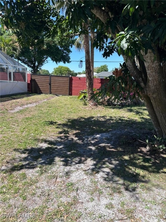 view of yard featuring fence