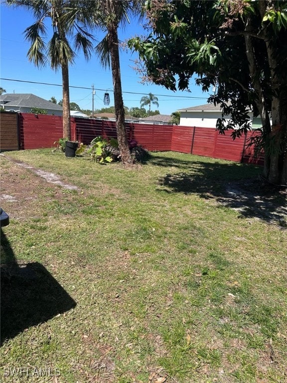 view of yard featuring fence