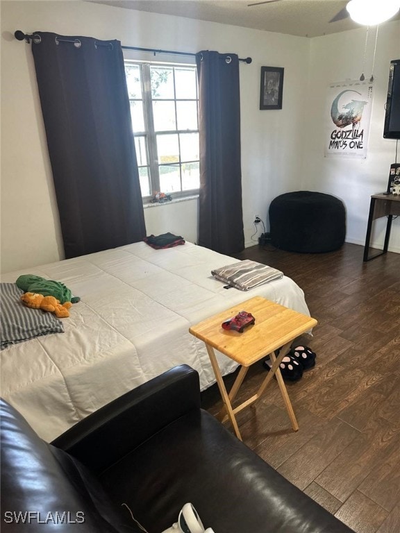 bedroom featuring wood finished floors