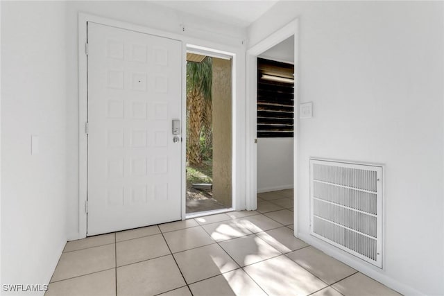 entryway featuring tile patterned floors