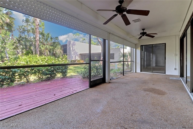 unfurnished sunroom with visible vents