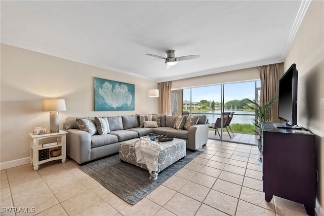 living area with a ceiling fan, crown molding, baseboards, and light tile patterned floors