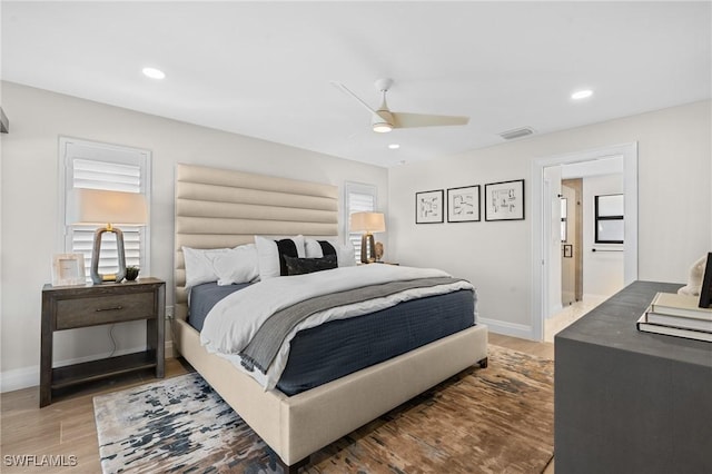 bedroom with visible vents, wood finished floors, recessed lighting, baseboards, and ceiling fan