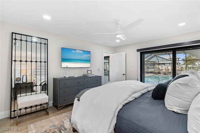 bedroom featuring access to outside, recessed lighting, light wood-style floors, and baseboards