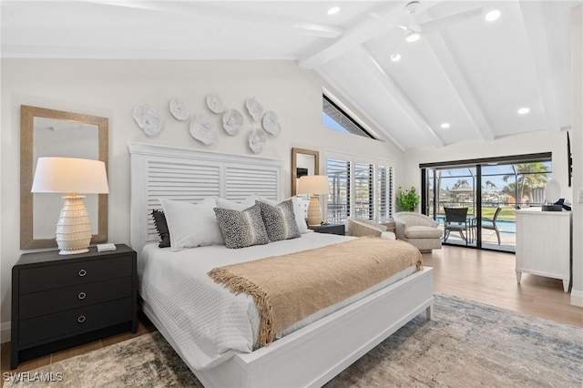 bedroom featuring lofted ceiling with beams, access to outside, multiple windows, and wood finished floors