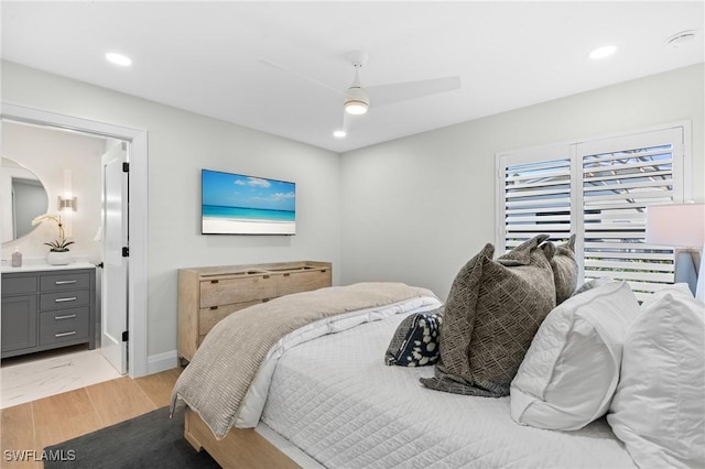 bedroom with recessed lighting, light wood-style floors, ceiling fan, and ensuite bathroom