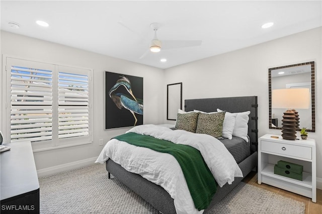 bedroom featuring a ceiling fan, recessed lighting, and baseboards