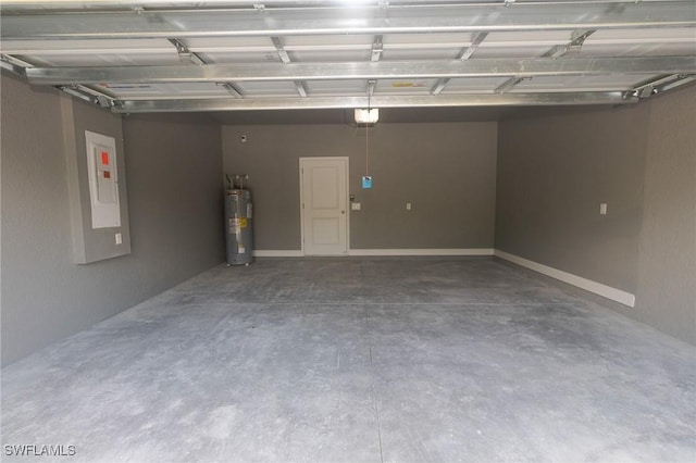 garage featuring electric panel, a garage door opener, and electric water heater