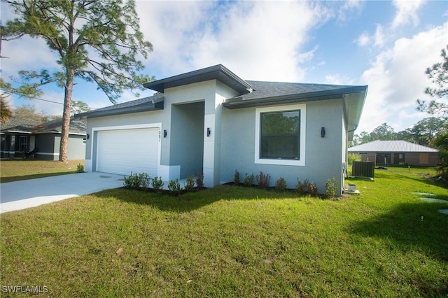 view of front facade featuring driveway, a garage, central AC unit, a front lawn, and stucco siding