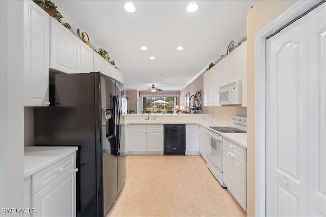 kitchen with light countertops, recessed lighting, white cabinets, black appliances, and a sink