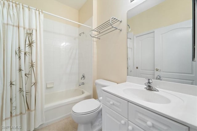 bathroom featuring vanity, tile patterned floors, toilet, and shower / bath combo