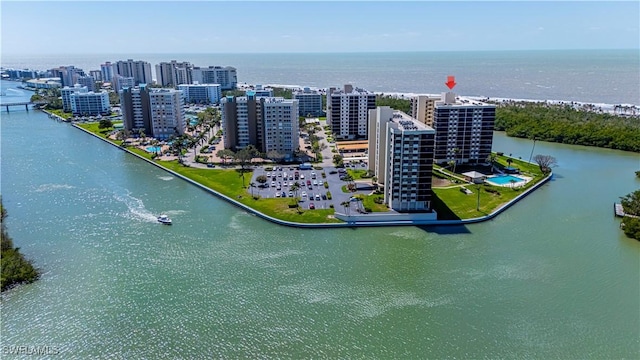 bird's eye view featuring a city view and a water view