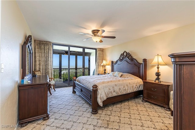 15 Bluebill Ave Unit 803, Naples, FL 34108 - bedroom featuring access to exterior, light carpet, and a ceiling fan