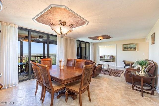 dining room featuring light tile patterned floors