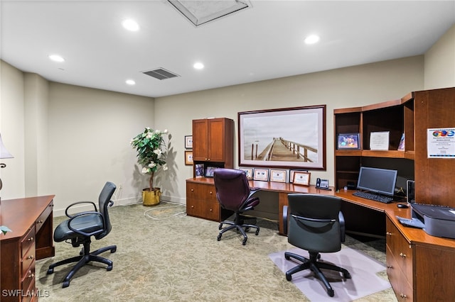 carpeted office space featuring recessed lighting, visible vents, and baseboards