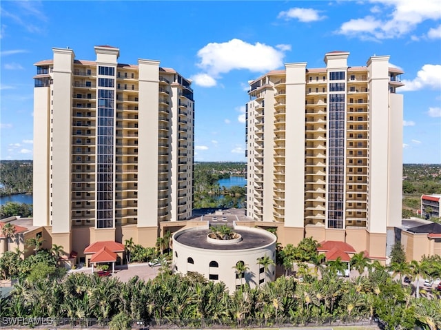 view of property with a water view