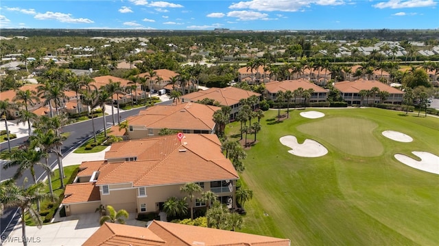 birds eye view of property featuring a residential view and golf course view