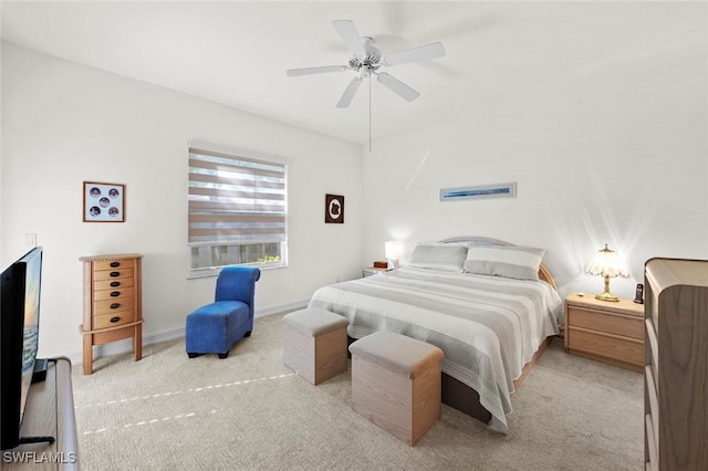 bedroom featuring carpet flooring, baseboards, and ceiling fan