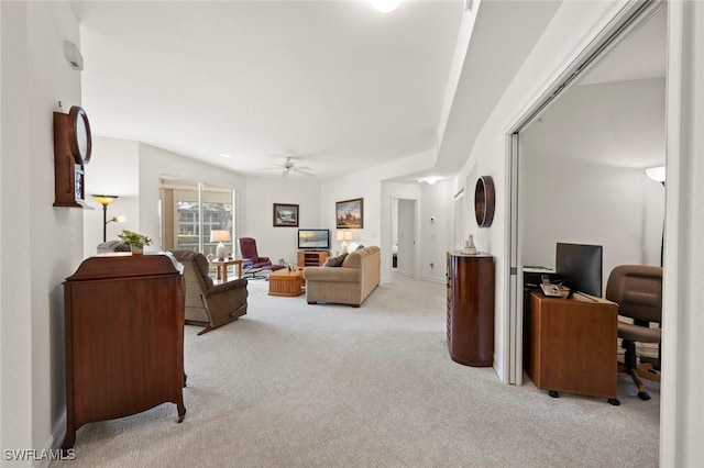 living room featuring light colored carpet and ceiling fan