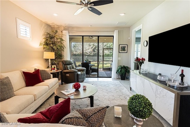 7658 Jacaranda Ln, Naples, FL 34114 - living room with light tile patterned floors, ceiling fan, and recessed lighting