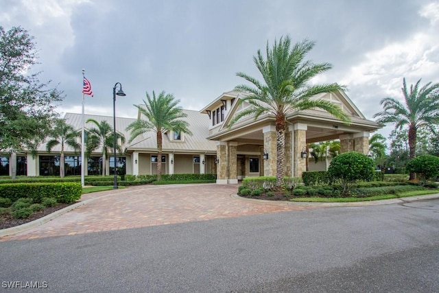 7658 Jacaranda Ln, Naples, FL 34114 - view of property featuring decorative driveway