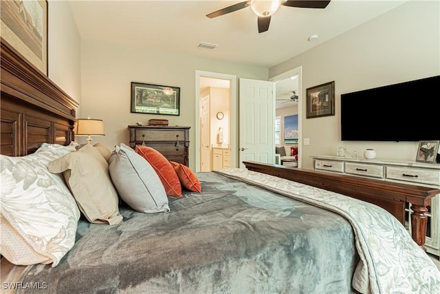 7658 Jacaranda Ln, Naples, FL 34114 - bedroom featuring visible vents, ensuite bath, and a ceiling fan