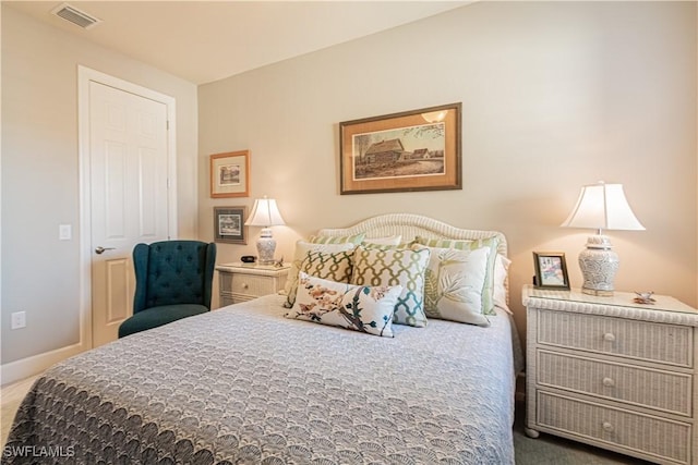 7658 Jacaranda Ln, Naples, FL 34114 - bedroom with carpet flooring, baseboards, and visible vents