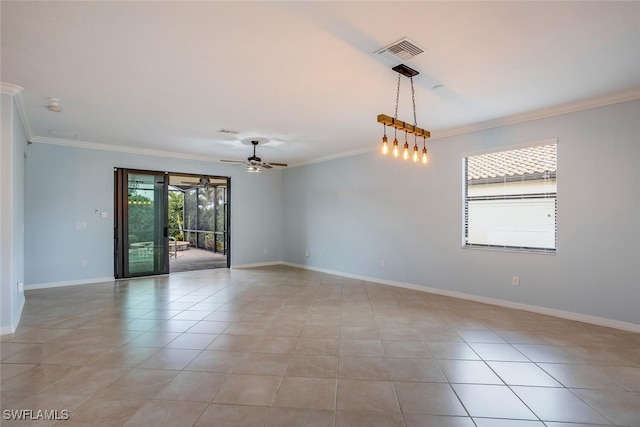 empty room featuring visible vents, crown molding, baseboards, and light tile patterned flooring