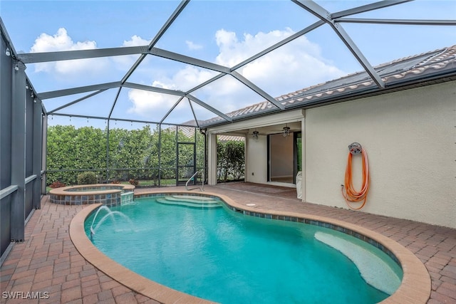 view of swimming pool with a pool with connected hot tub, a patio area, and a lanai