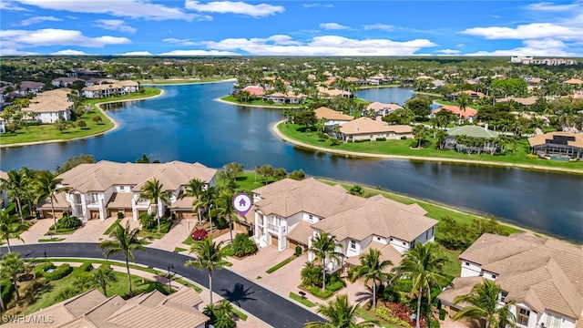 aerial view featuring a water view and a residential view