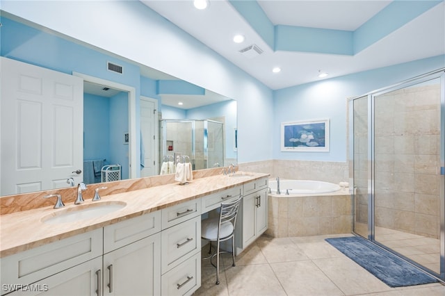 bathroom featuring a bath, a sink, visible vents, and a shower stall