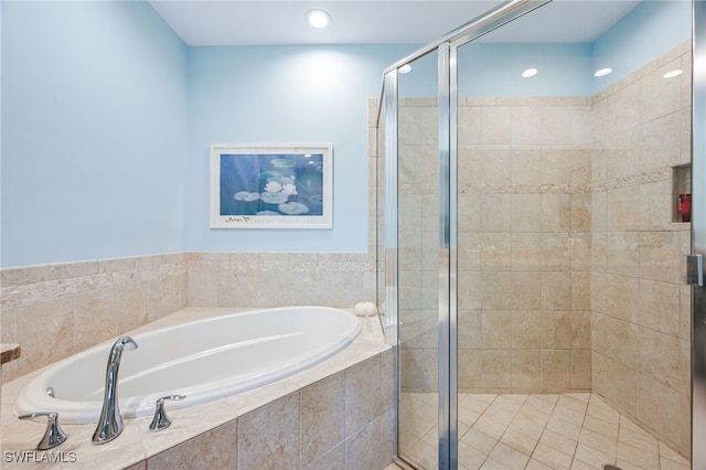 full bathroom featuring a garden tub, a shower stall, and recessed lighting