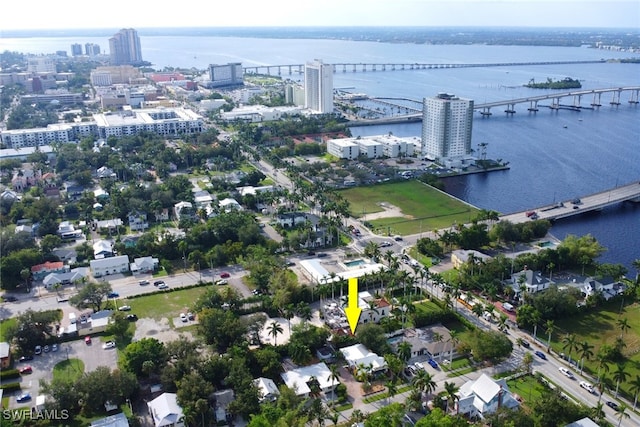 bird's eye view featuring a view of city and a water view