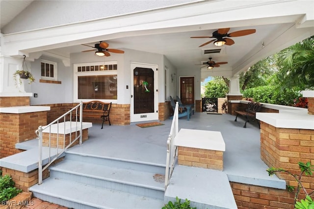 view of patio / terrace featuring ceiling fan, visible vents, and a porch