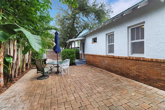 view of patio with outdoor dining area