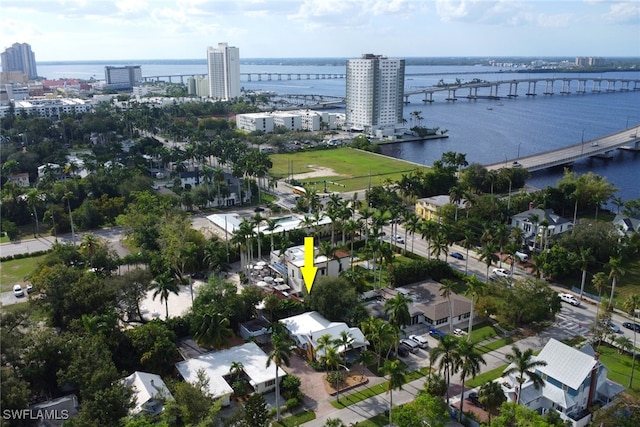 aerial view featuring a water view and a city view