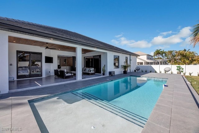 view of pool featuring a fenced backyard, outdoor lounge area, a fenced in pool, and a patio